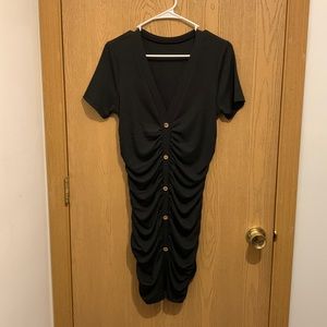 Black mini dress, synched sides and back